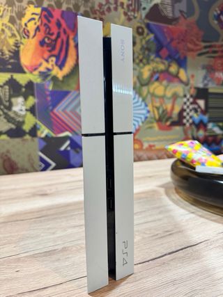 PS4 Fat 500GB Bianca + 11 Giochi + Joypad Rosso