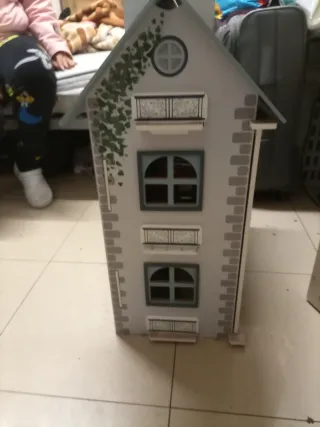 Casa de juguete de madera