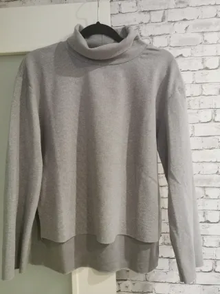 Jersey gris cuello alto