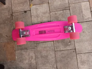 Monopatín rosa