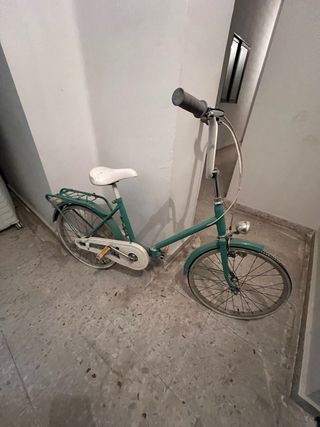 Bicicleta vintage verde plegable