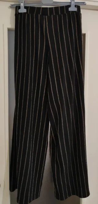 Pantalón H&M pinzas rayas doradas.