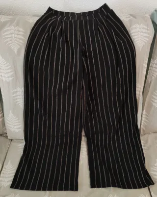 Pantalón H&M pinzas rayas doradas.