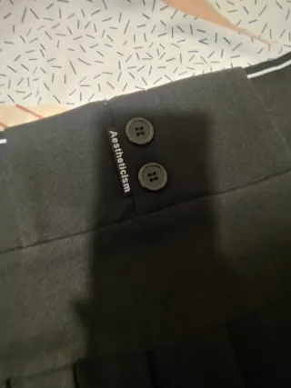 Minifalda negra plisada