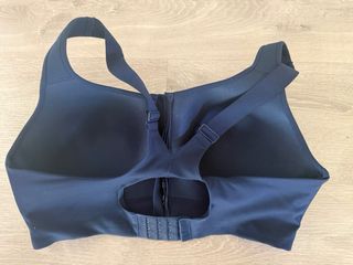 Sujetador deportivo SOMA azul con cremallera