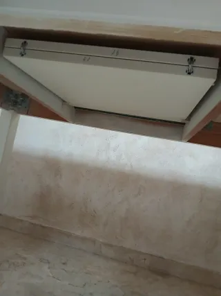 Mesa de comedor extensible de madera