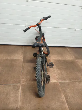 Bicicleta niño con freno disco naranja