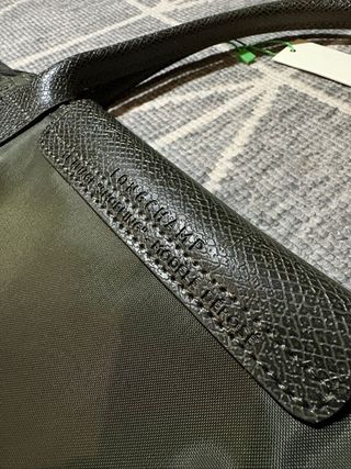 Mala Longchamp L verde com detalhes em couro