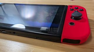 Nintendo Switch + Funda + Volantes + SD128gb