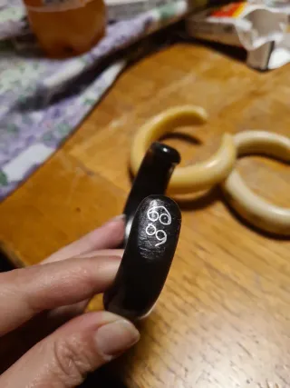 3 Bracciali beige e neri