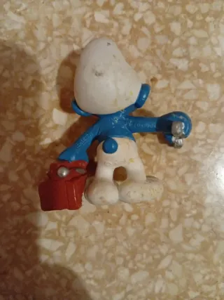 Pitufo con caja de herramientas