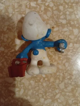 Pitufo con caja de herramientas