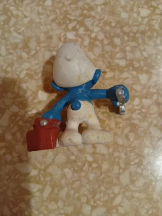 Pitufo con caja de herramientas