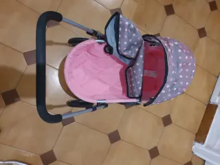 Cochecito de muñecas rosa lunares