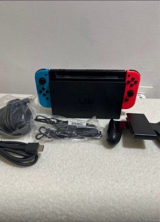 Nintendo Switch Azul y Rojo con Estuche y caja
