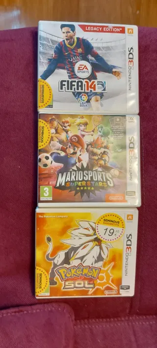 Nintendo 2DS con funda y 4 juegos