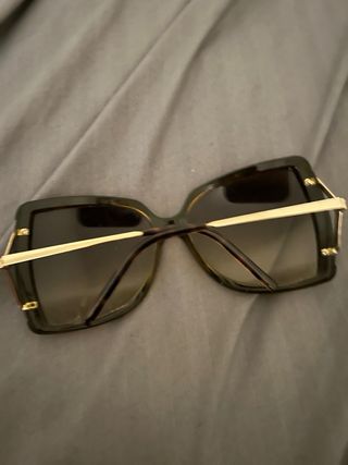 Gafas de sol Gucci marrones y doradas
