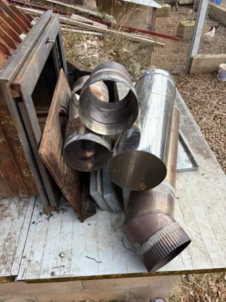 Caset de leña metálico