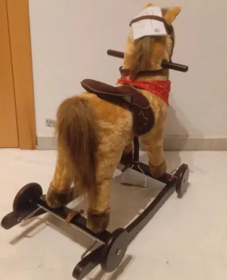 Caballo balancín con ruedas y sonido