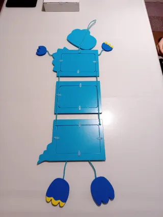 Cornice portafoto dinosauro blu e giallo.