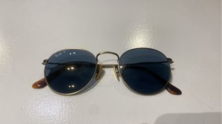 Gafas de sol Ray-Ban redondas doradas