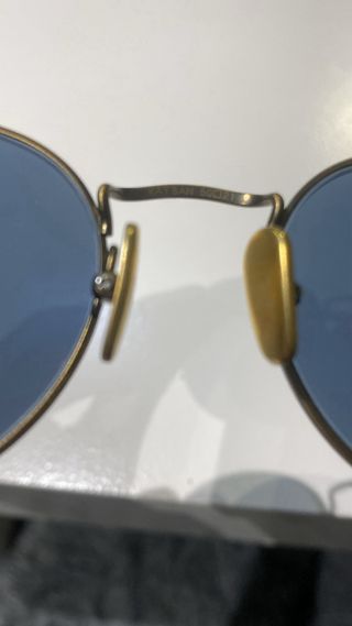 Gafas de sol Ray-Ban redondas doradas