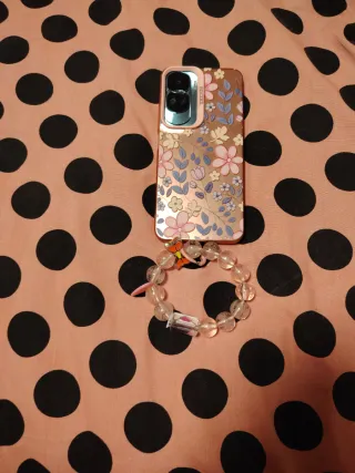Funda móvil floral con pulsera