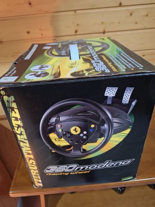 Xbox con volante Ferrari y 6 juegos