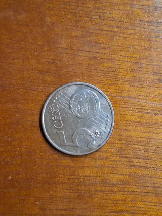 Moneda 5 cent. 2008 con errores visible