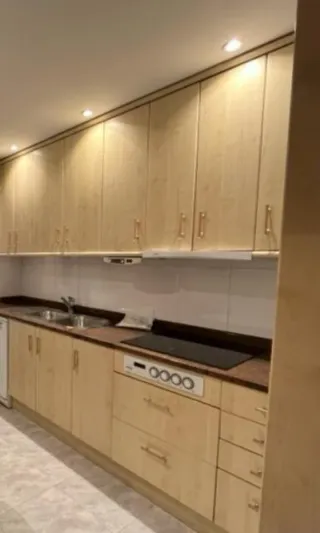 Tiradores madera y metal cocina