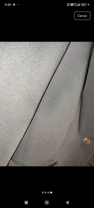 Blazer negro con cuello de volantes