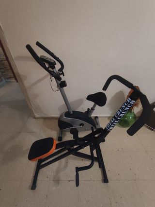 Bicicleta Estática Plata y Negra y total crunch