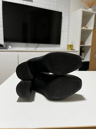 Botas negras con plataforma y tacón