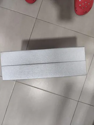 Caja Reebok gris plateada