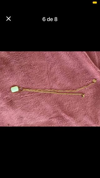 Colar em aço dourado com pingente verde