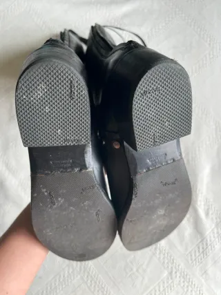 Botas altas negras con tachuelas