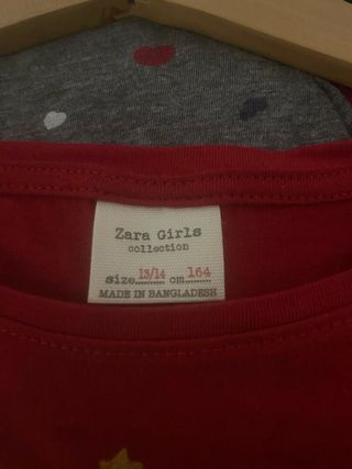 Camiseta roja con estrellas doradas talla 13/14