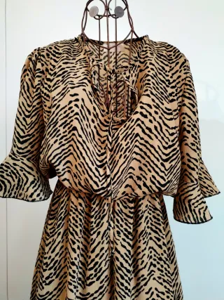 Abito fantasia zebrata beige e nero