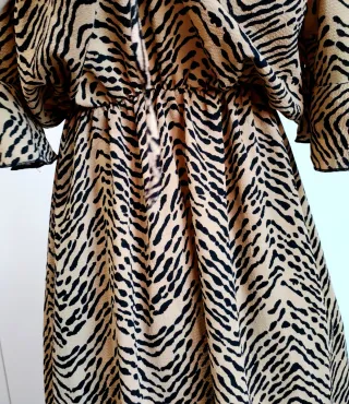 Abito fantasia zebrata beige e nero