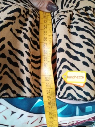 Abito fantasia zebrata beige e nero