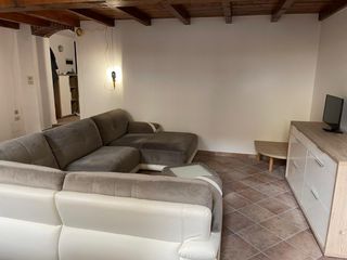 Divano a U con Tavolino in Vetro