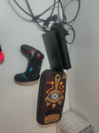 NINTENDO SWITCH+ 2 Juegos+ MANDO REGULAR + pro