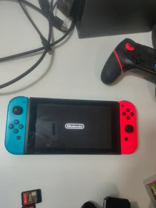 NINTENDO SWITCH+ 2 Juegos+ MANDO REGULAR + pro