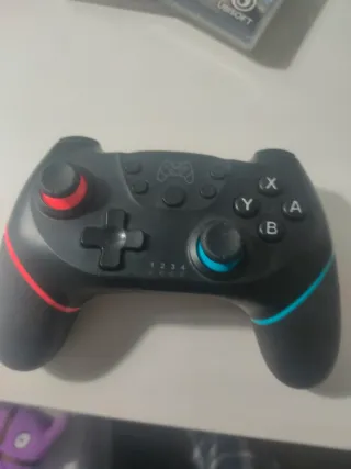 NINTENDO SWITCH+ 2 Juegos+ MANDO REGULAR + pro