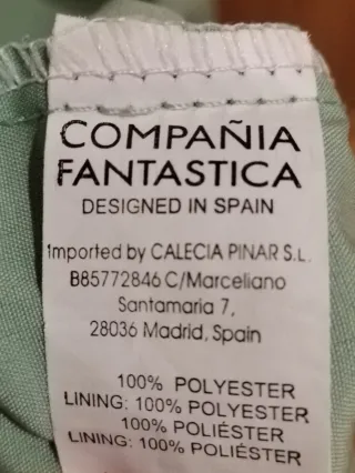 Vestido verde sin mangas con lazo