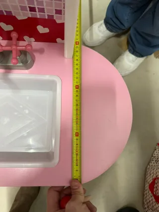 Cocinita de juguete rosa y gris