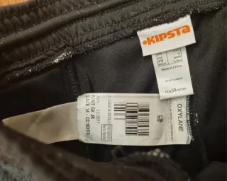 Pantaloni sportivi neri con protezioni