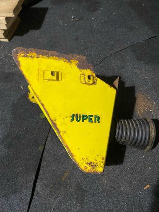 Guardabarros delantero y caja filtro Puch