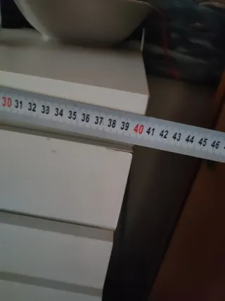 Mobile alto bianco con cassetti