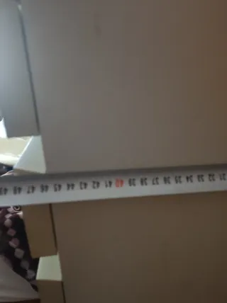 Mobile alto bianco con cassetti